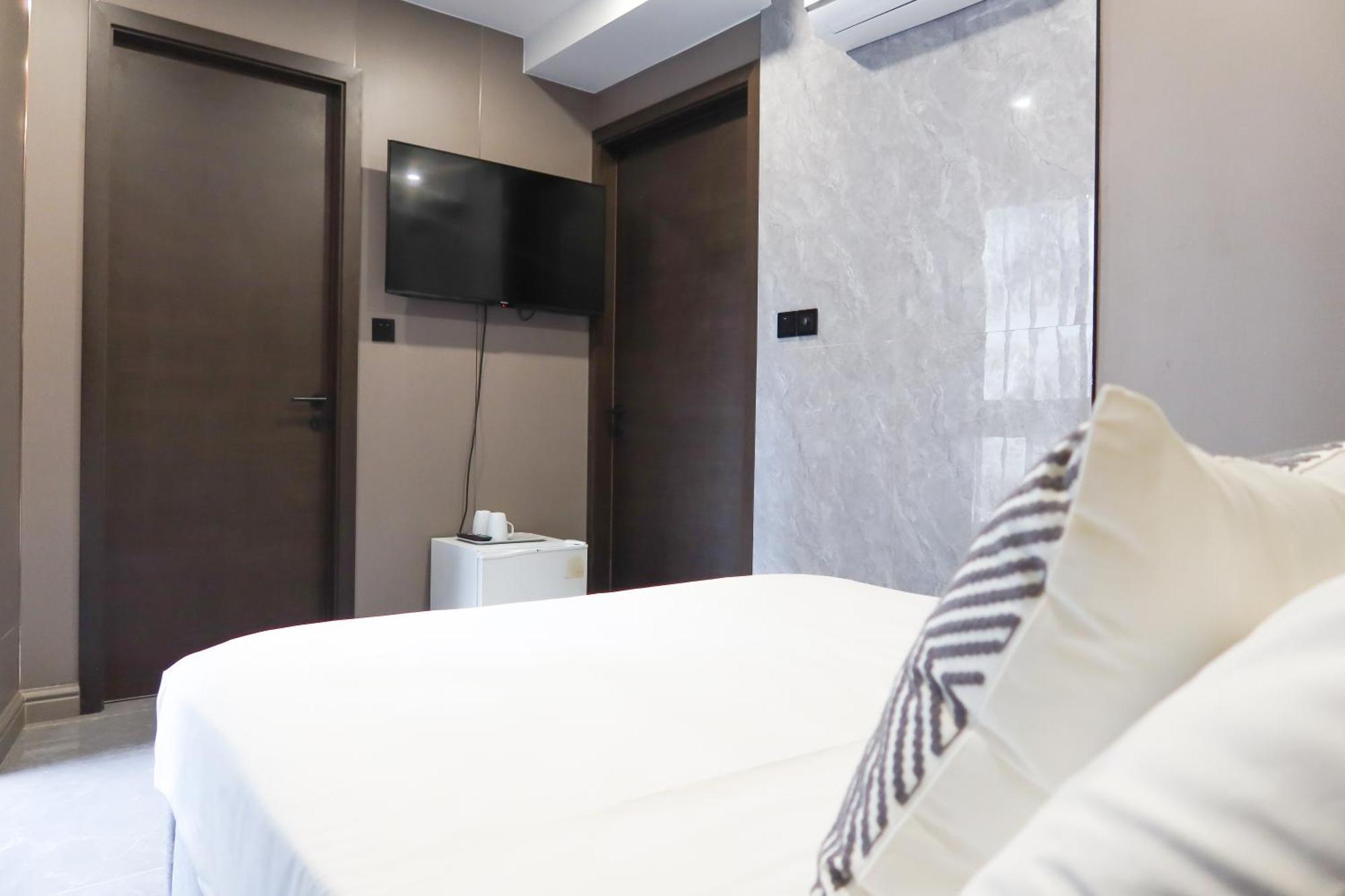 Recharge Studio Apartment & Suites Singapore Rum bild