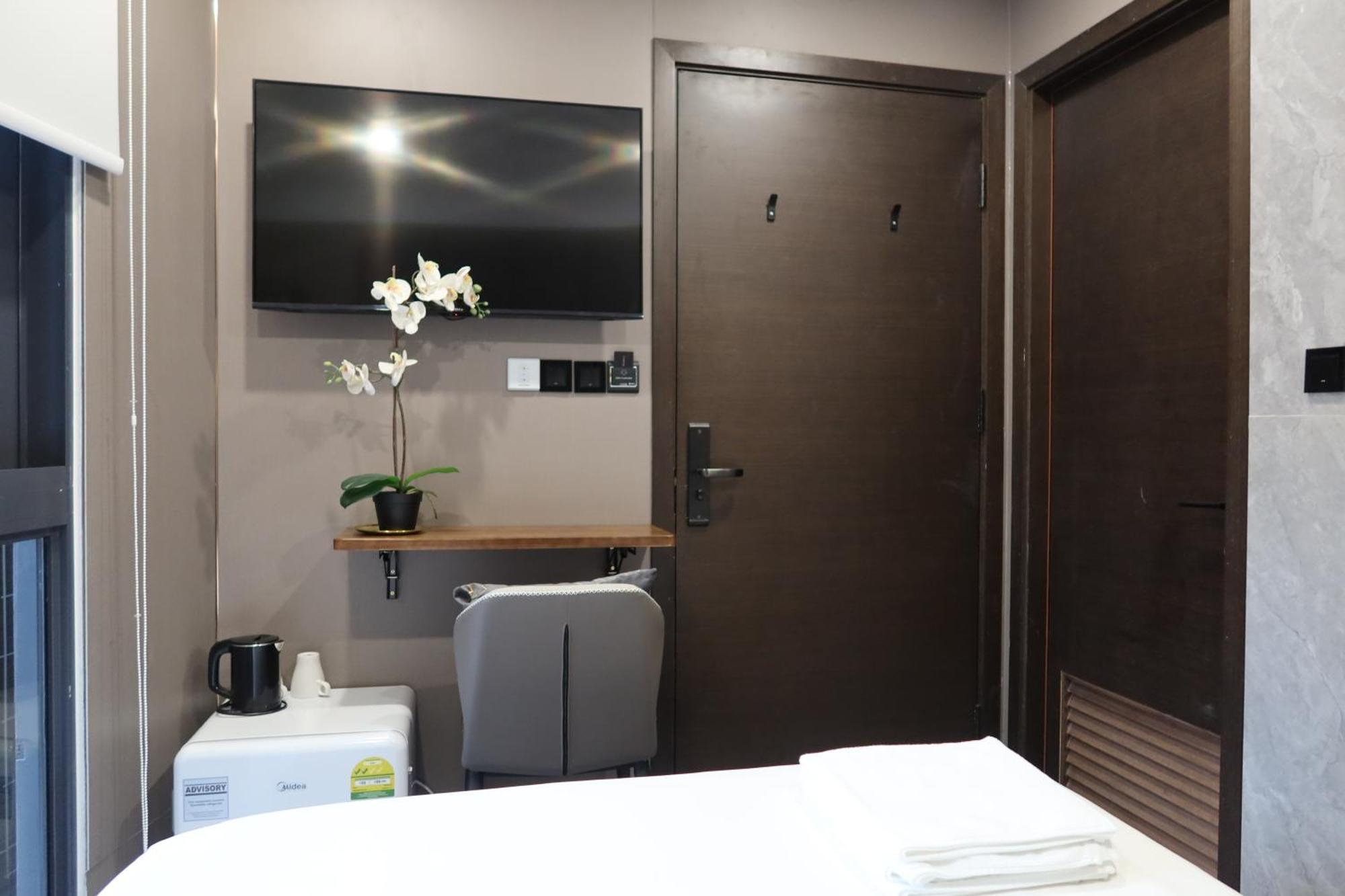 Recharge Studio Apartment & Suites Singapore Rum bild